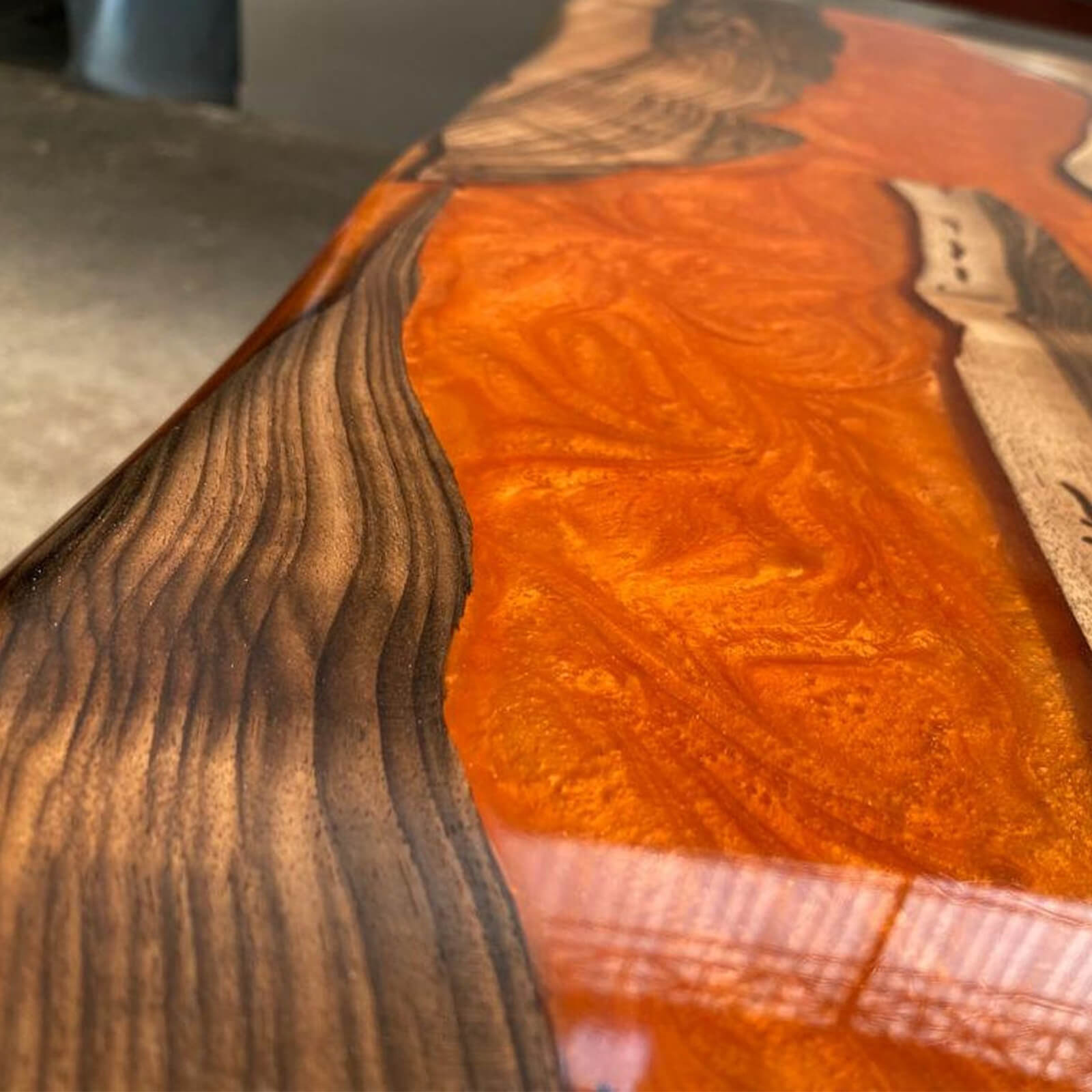 custom-walnut-epoxy-resin-river-table-orange-resin-wet-72-29
