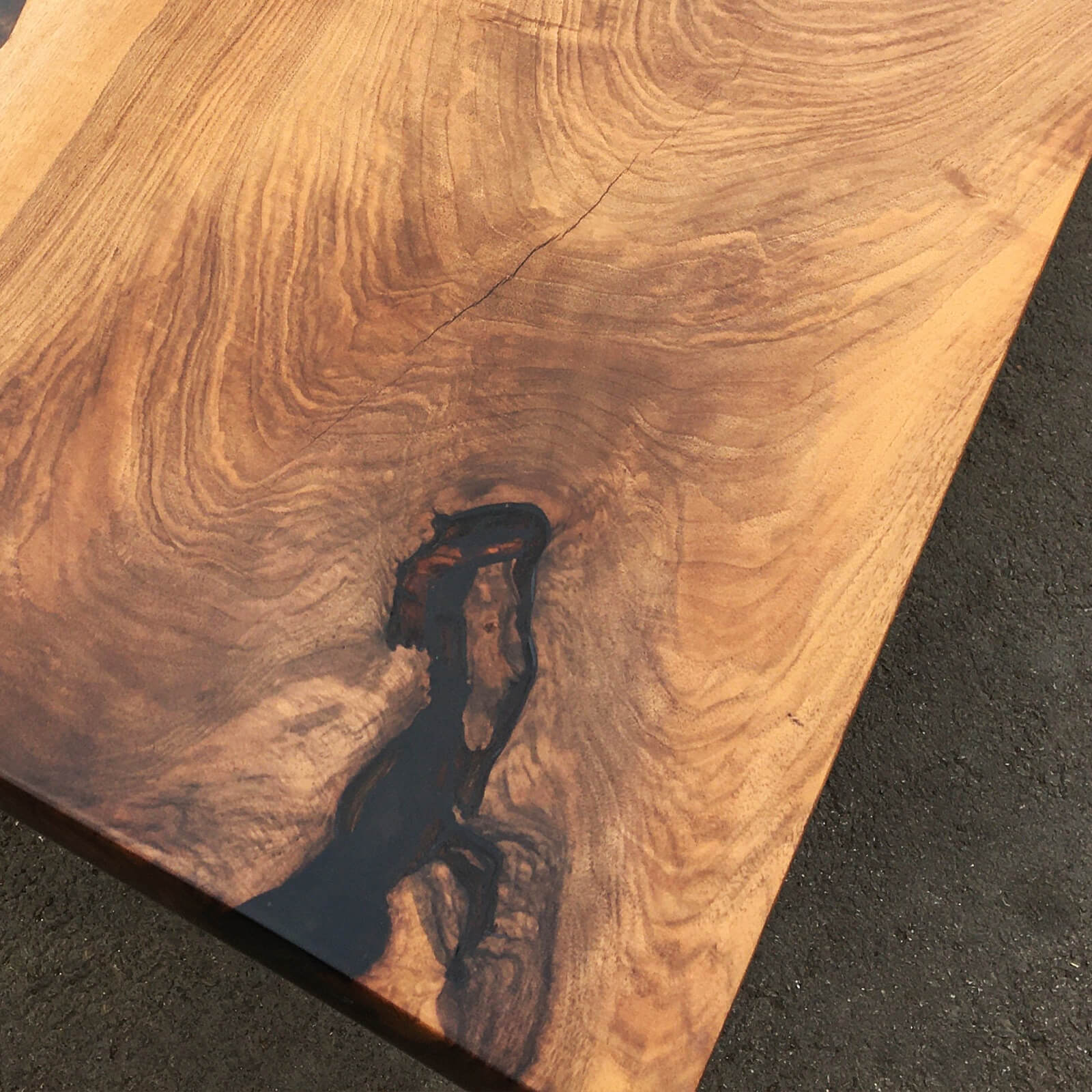 custom-black-walnut-epoxy-resin-river-table-black-resin-qtr-28-88